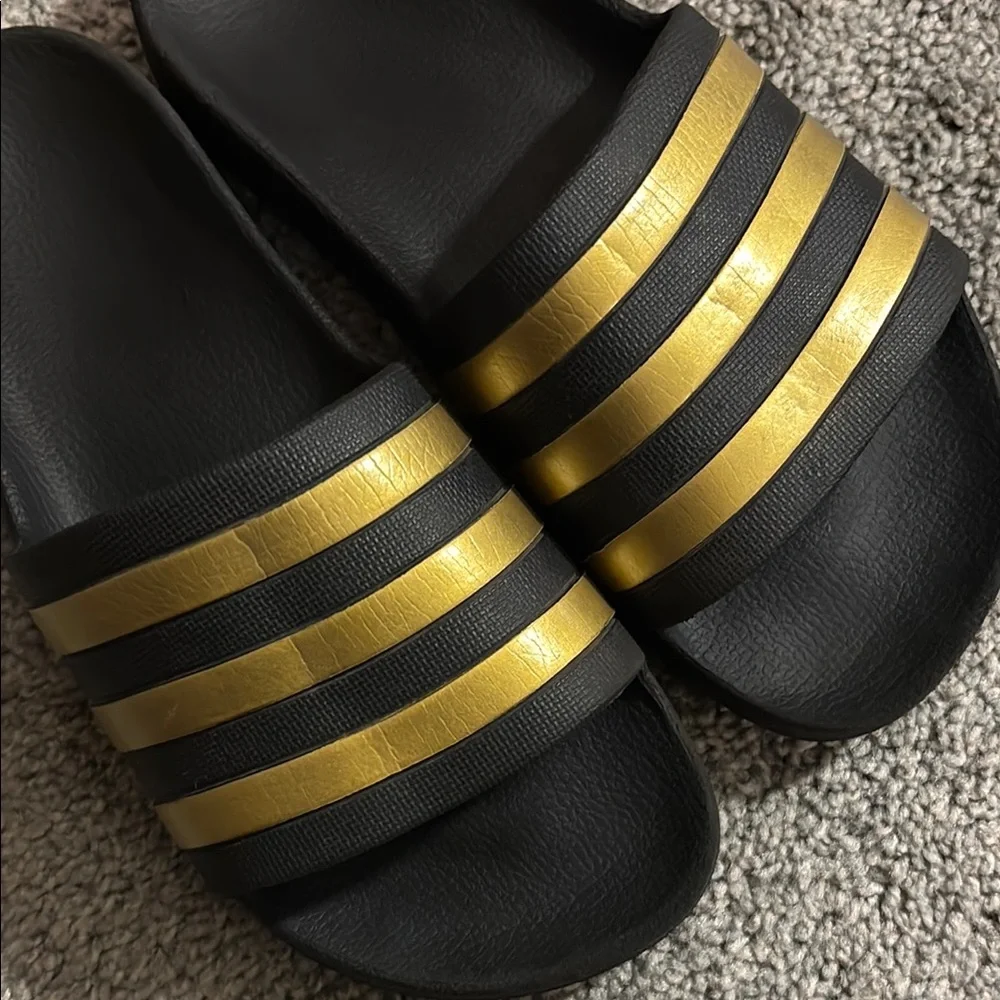 adidas Black Slide Sandals with Metallic Gold Stripes